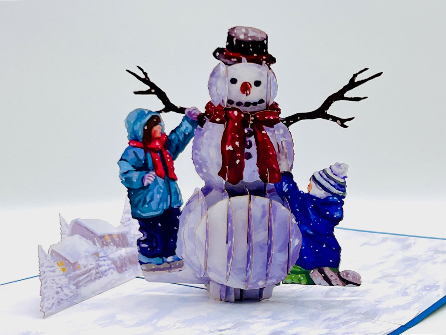 Christmas Kids building snowman