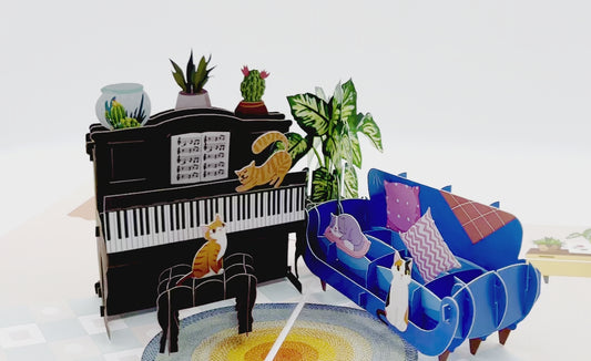 A pop-up card featuring a cats with a piano, showing all side of the pop up card