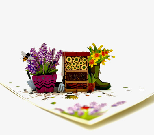 A pop up card featuring a beautiful daffodil and a lavender bug hotel